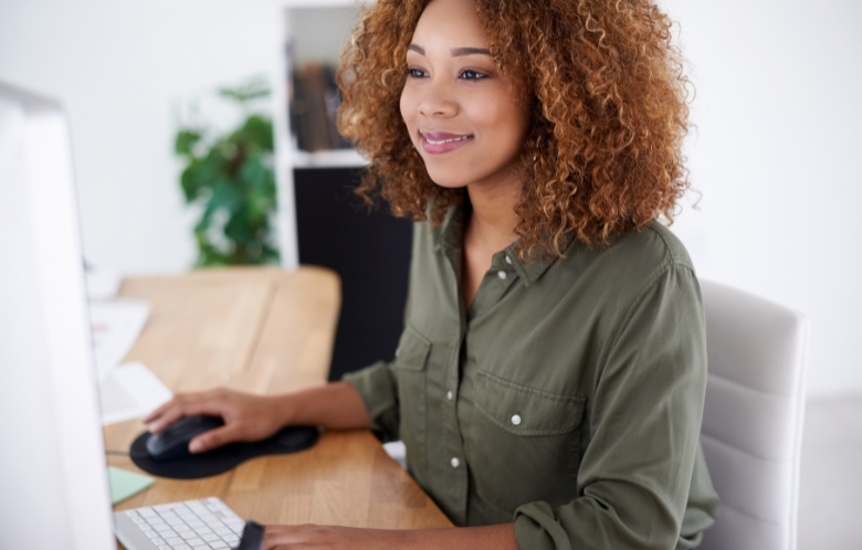 woman looking at a computer