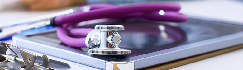 Tablet and clipboard with a stethoscope