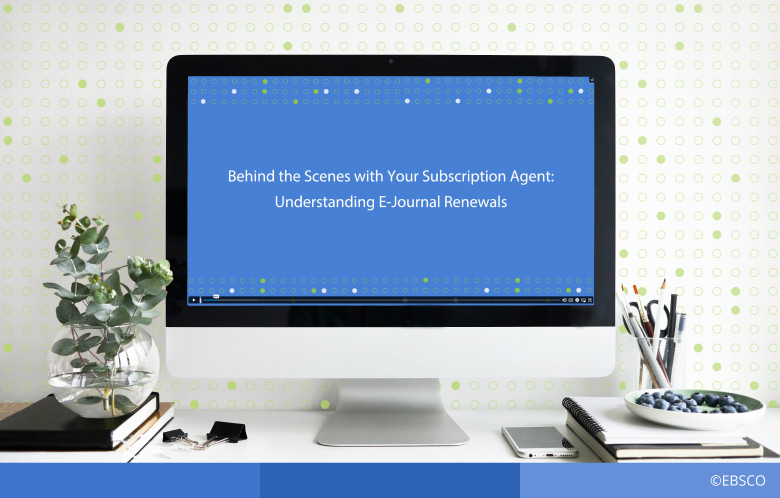Screenshot of “Behind the Scenes with Your Subscription Agent: Understanding E-Journal Renewals” video in computer on desk with plant, notebooks and phone.