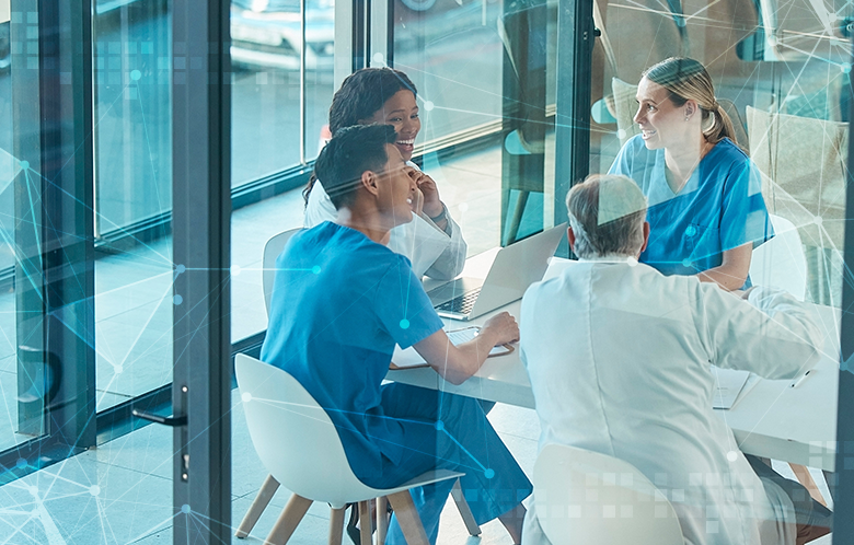 group of doctors talking in a meeting room