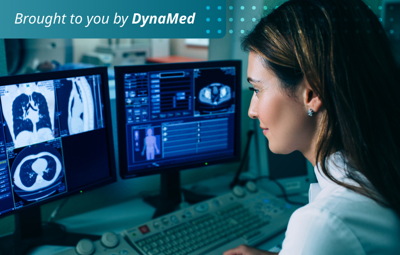 Radiologist reading a CT scan. Female doctor running CT scan from control room at hospital