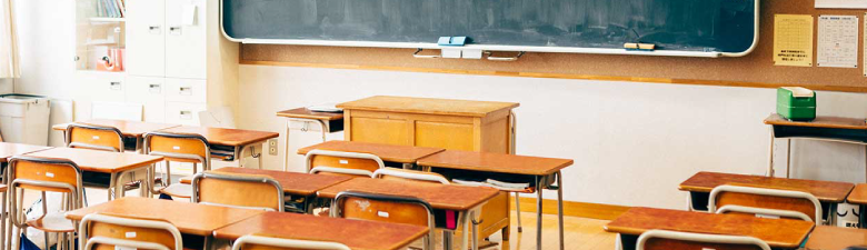 podium in front of a classroom