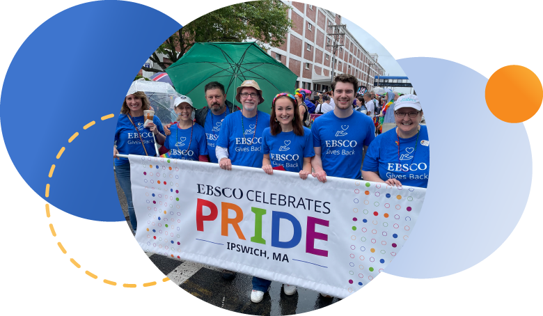 EBSCO workers walking in Pride parade with banner that says "EBSCO Celebrates Pride, Ipswich, MA"